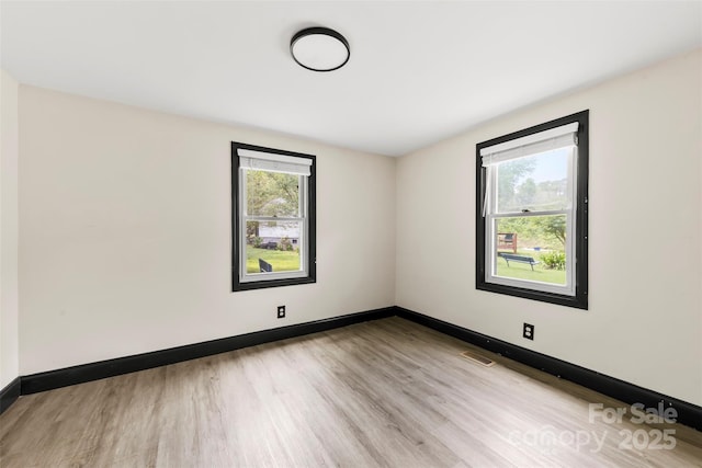 103 Fleetwood Rd, York, SC 29745 - spare room with light wood-style floors and baseboards