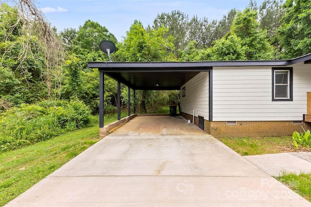 103 Fleetwood Rd, York, SC 29745 - view of vehicle parking with concrete driveway and an attached carport