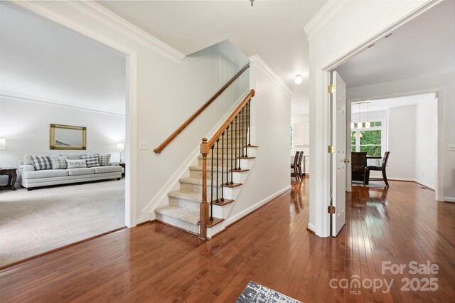 8217 Lansford Rd, Charlotte, NC 28277 - stairway with hardwood / wood-style flooring and ornamental molding