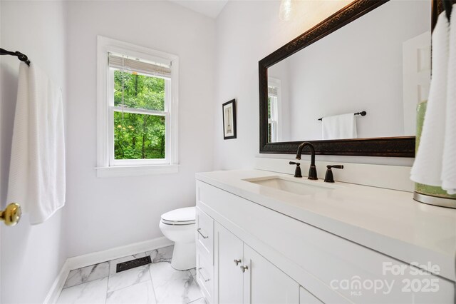 8217 Lansford Rd, Charlotte, NC 28277 - bathroom featuring marble look tiles and vanity