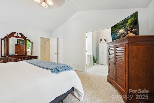8217 Lansford Rd, Charlotte, NC 28277 - bedroom featuring vaulted ceiling, light carpet, and ensuite bath