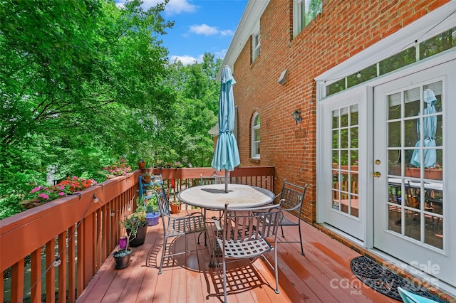 8217 Lansford Rd, Charlotte, NC 28277 - wooden deck featuring outdoor dining space and french doors