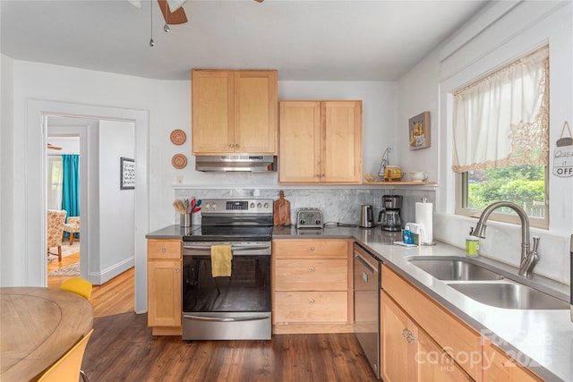 7 Grove St, Weaverville, NC 28787 - kitchen with stainless steel appliances, under cabinet range hood, light brown cabinetry, a sink, and dark wood-type flooring