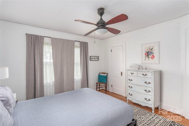 7 Grove St, Weaverville, NC 28787 - bedroom featuring baseboards, light wood-type flooring, and ceiling fan