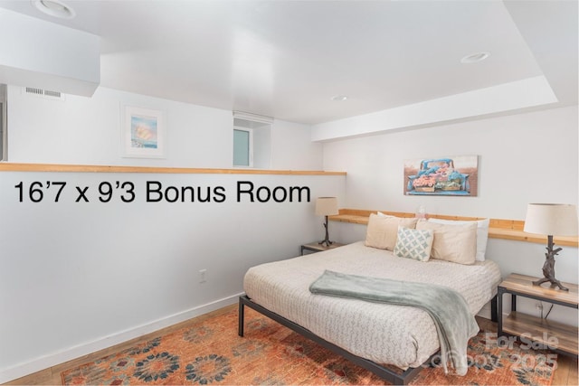 7 Grove St, Weaverville, NC 28787 - bedroom featuring wood finished floors, baseboards, and recessed lighting