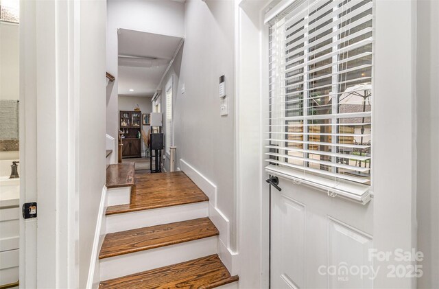 1621 Brookdale Ave, Charlotte, NC 28210 - entryway featuring stairway and baseboards