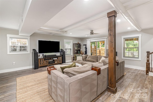 1621 Brookdale Ave, Charlotte, NC 28210 - living room featuring beamed ceiling, baseboards, light wood finished floors, recessed lighting, and plenty of natural light