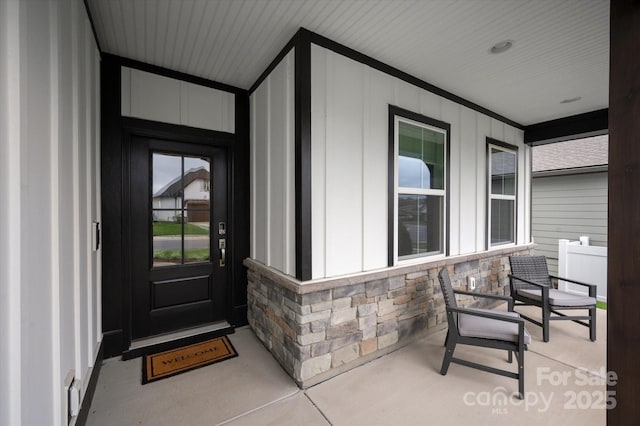 602 Compass Dr, Denver, NC 28037 - view of exterior entry with covered porch and stone siding