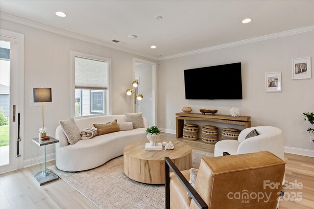 602 Compass Dr, Denver, NC 28037 - living area featuring light wood finished floors, crown molding, baseboards, and recessed lighting