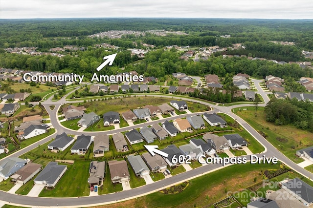 602 Compass Dr, Denver, NC 28037 - aerial view of property's location featuring nearby suburban area and a heavily wooded area
