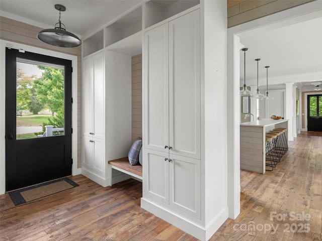 146 Lower Brush Creek Rd, Fletcher, NC 28732 - mudroom featuring light wood-type flooring, ornamental molding, and a sink