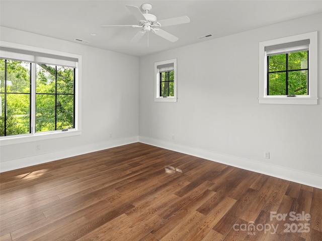 146 Lower Brush Creek Rd, Fletcher, NC 28732 - unfurnished room with baseboards, dark wood-style floors, and ceiling fan