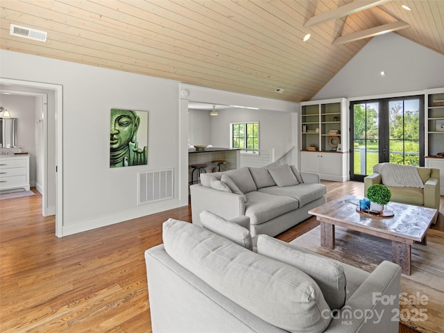 146 Lower Brush Creek Rd, Fletcher, NC 28732 - living area featuring wood ceiling, high vaulted ceiling, light wood-type flooring, and baseboards