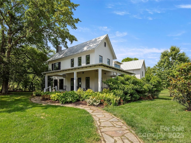146 Lower Brush Creek Rd, Fletcher, NC 28732 - modern farmhouse with a chimney, a front lawn, and covered porch