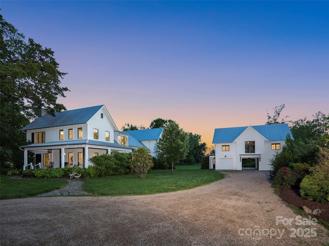 146 Lower Brush Creek Rd, Fletcher, NC 28732 - view of front of home featuring metal roof, driveway, a front lawn, a standing seam roof, and an outdoor structure