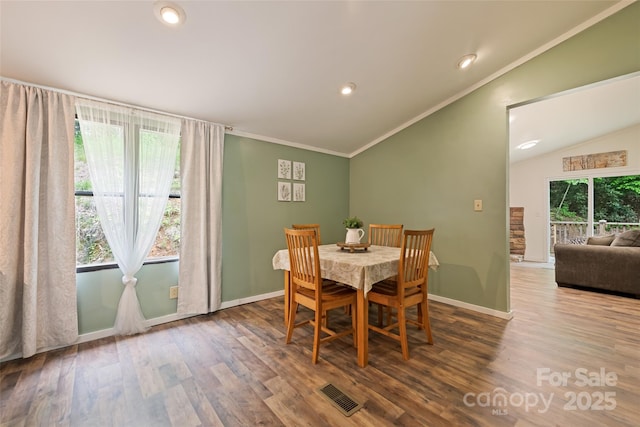 100 Bettys Dr, Waynesville, NC 28786 - dining space with vaulted ceiling, wood finished floors, crown molding, baseboards, and recessed lighting