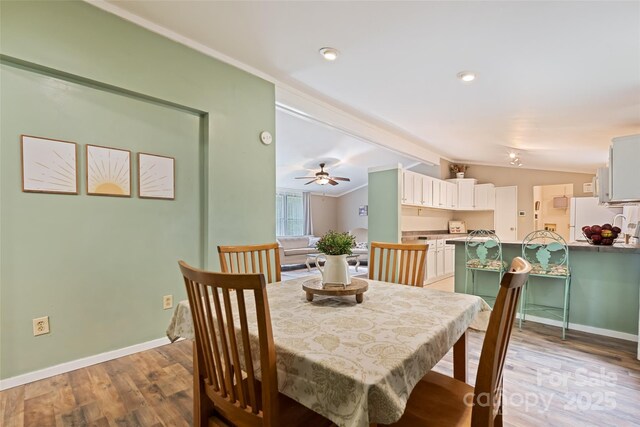 100 Bettys Dr, Waynesville, NC 28786 - dining space featuring vaulted ceiling, light wood-style flooring, baseboards, ceiling fan, and recessed lighting