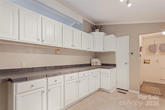 100 Bettys Dr, Waynesville, NC 28786 - kitchen with white cabinetry and dark countertops