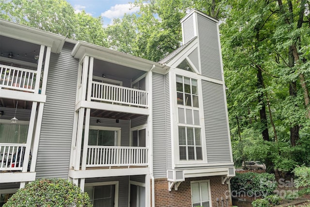 2512 Cranbrook Ln Unit 9, Charlotte, NC 28207 - view of side of property featuring brick siding