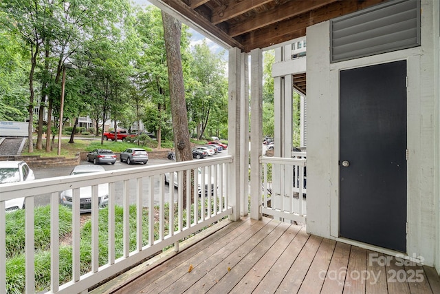 2512 Cranbrook Ln Unit 9, Charlotte, NC 28207 - deck with view of wooded area