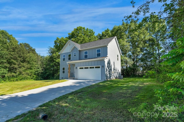 7874 Lucky Creek Ln, Denver, NC 28037 - view of front of home with board and batten siding, driveway, a front lawn, an attached garage, and roof with shingles
