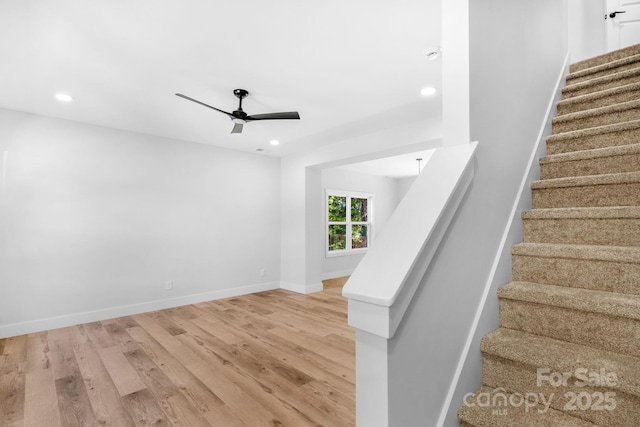 7874 Lucky Creek Ln, Denver, NC 28037 - stairway featuring wood finished floors, a ceiling fan, recessed lighting, and baseboards