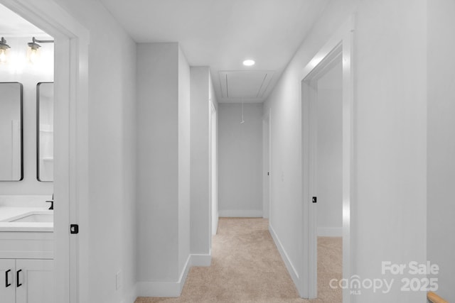 7874 Lucky Creek Ln, Denver, NC 28037 - corridor featuring attic access, a sink, light colored carpet, baseboards, and recessed lighting