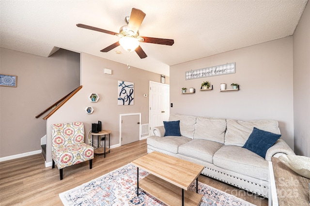 102 Brandywine Dr NE Unit O-3, Conover, NC 28613 - living area with a ceiling fan, light wood-style flooring, and baseboards