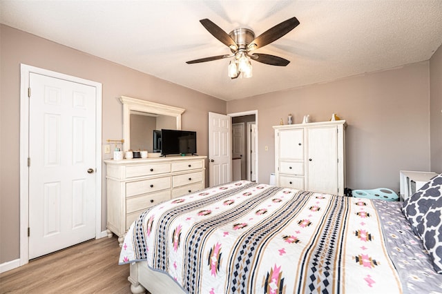 102 Brandywine Dr NE Unit O-3, Conover, NC 28613 - bedroom with light wood-type flooring and a ceiling fan