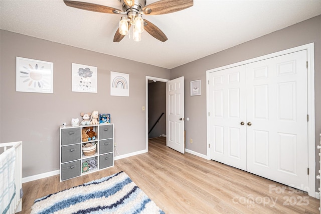 102 Brandywine Dr NE Unit O-3, Conover, NC 28613 - bedroom featuring baseboards, wood finished floors, and a closet