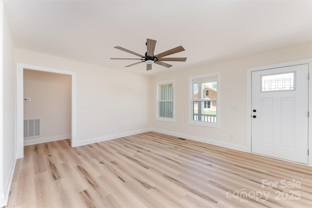 406 N Bostian St, China Grove, NC 28023 - entryway with light wood-type flooring, a ceiling fan, and baseboards