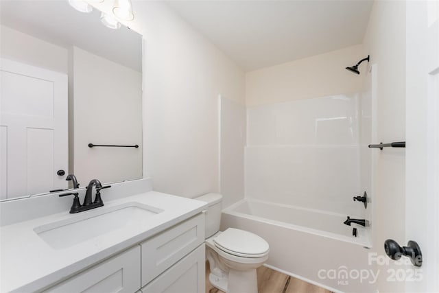 406 N Bostian St, China Grove, NC 28023 - bathroom with toilet, vanity, bathtub / shower combination, and wood finished floors