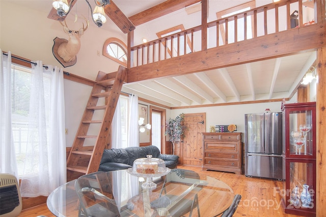 109 Larch Rd, Salisbury, NC 28147 - dining space featuring plenty of natural light, beamed ceiling, wood finished floors, and stairs