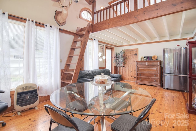 109 Larch Rd, Salisbury, NC 28147 - dining area with plenty of natural light, light wood-style floors, heating unit, and beam ceiling
