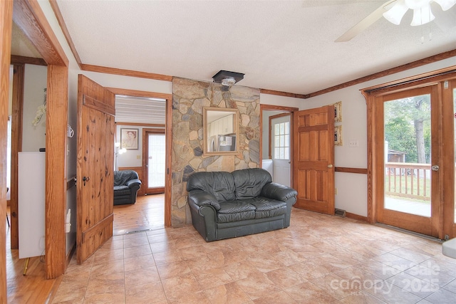 109 Larch Rd, Salisbury, NC 28147 - living room with a textured ceiling, crown molding, and ceiling fan