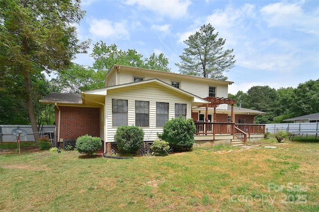 109 Larch Rd, Salisbury, NC 28147 - back of property featuring a pergola, a wooden deck, and brick siding