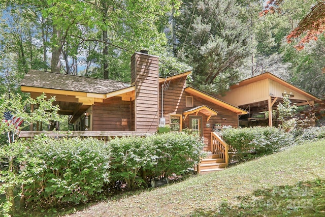 46 Thrush Dr, Maggie Valley, NC 28751 - view of front facade featuring a chimney