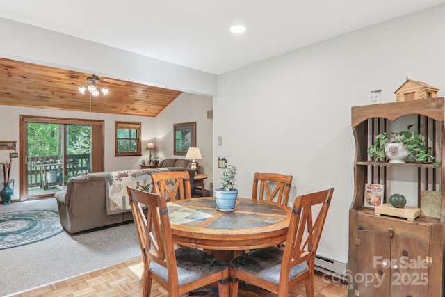 46 Thrush Dr, Maggie Valley, NC 28751 - dining room featuring vaulted ceiling, wood ceiling, a baseboard heating unit, and recessed lighting