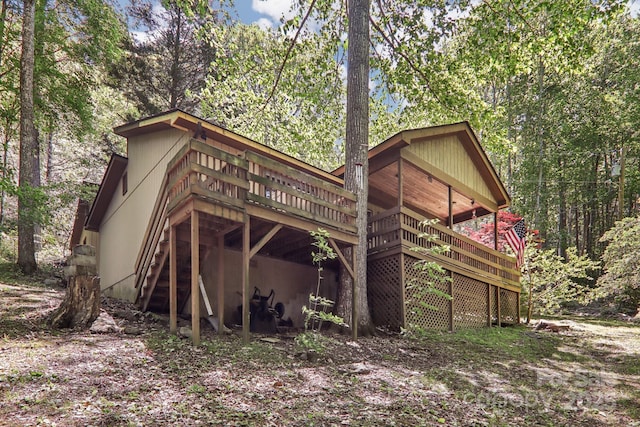 46 Thrush Dr, Maggie Valley, NC 28751 - rear view of property with a wooden deck and stairway