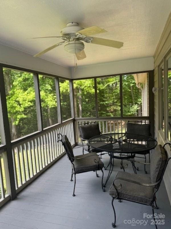 240 Goshen Ter, Wilkesboro, NC 28697 - sunroom / solarium with a ceiling fan, healthy amount of natural light, and outdoor dining area