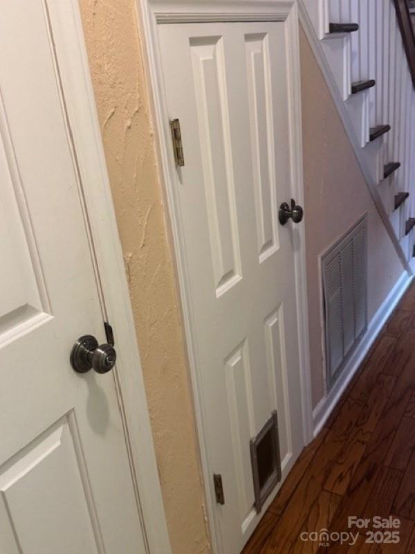 240 Goshen Ter, Wilkesboro, NC 28697 - detailed view of wood finished floors and a textured wall