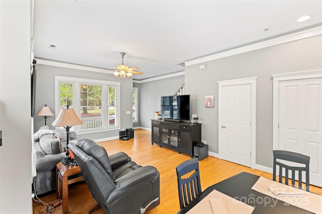 3007 Colonel Springs Way, Fort Mill, SC 29708 - living area featuring light wood finished floors, a ceiling fan, crown molding, and baseboards