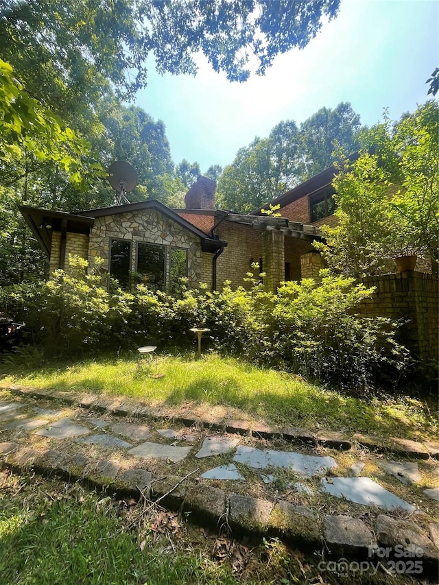 2505 White Thorne Ln, Waxhaw, NC 28173 - back of house featuring stone siding