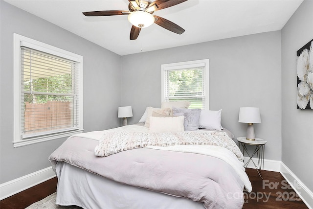 2421 Shamrock Dr, Charlotte, NC 28205 - bedroom with baseboards, wood finished floors, and ceiling fan
