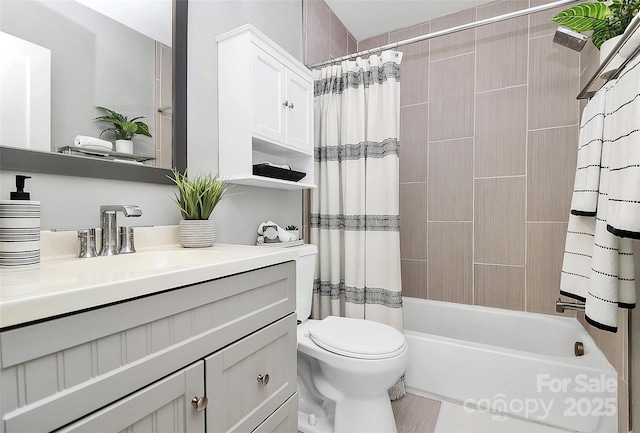 2421 Shamrock Dr, Charlotte, NC 28205 - full bathroom featuring vanity, toilet, and shower / tub combo with curtain