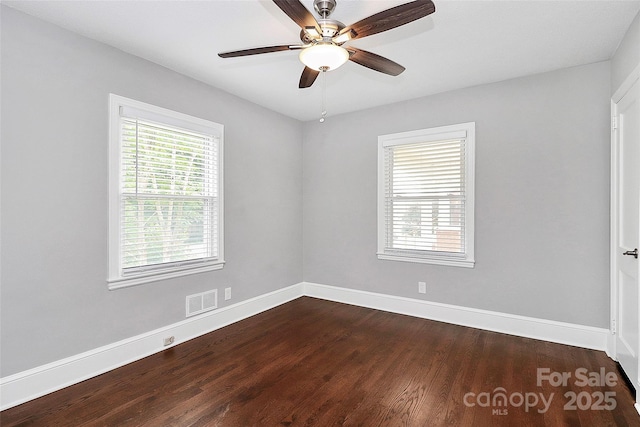 2421 Shamrock Dr, Charlotte, NC 28205 - empty room with baseboards, dark wood-style flooring, and ceiling fan