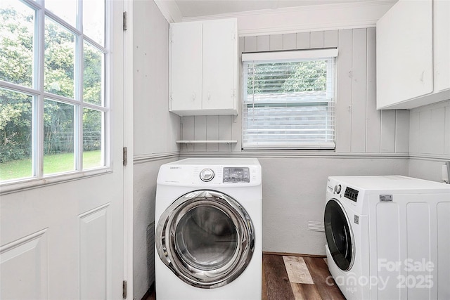 2421 Shamrock Dr, Charlotte, NC 28205 - laundry room with independent washer and dryer, cabinet space, and healthy amount of natural light