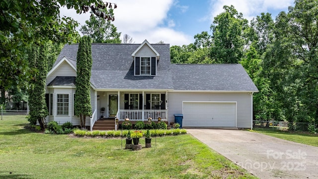 1321 Birch Dr, Morganton, NC 28655 - cape cod-style house with covered porch, a garage, driveway, and a shingled roof