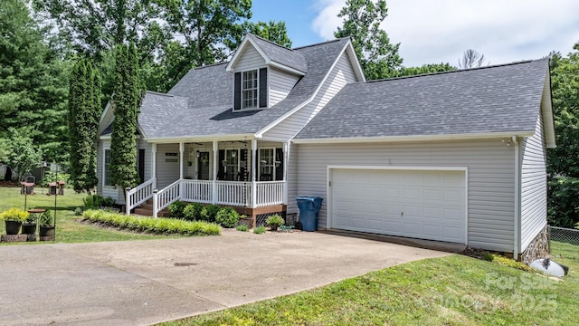 1321 Birch Dr, Morganton, NC 28655 - cape cod house featuring covered porch, a shingled roof, driveway, and a front yard