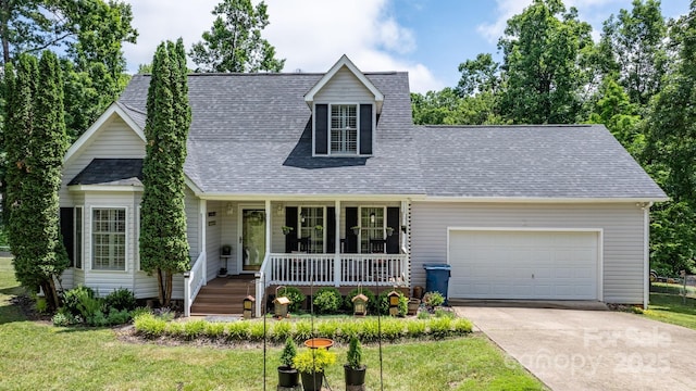 1321 Birch Dr, Morganton, NC 28655 - cape cod home with a porch, driveway, roof with shingles, a garage, and a front lawn